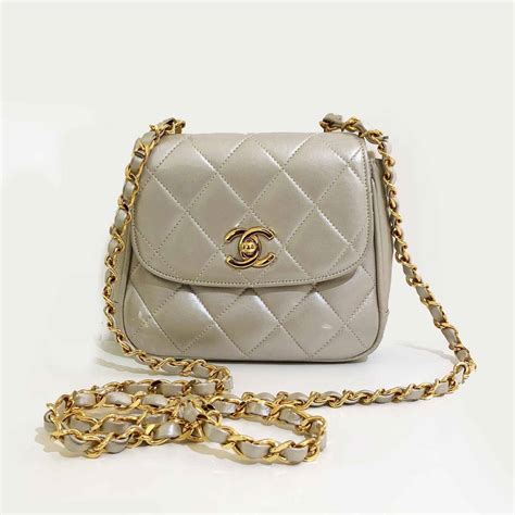 chanel bag pearl handle|chanel small quilted bag.